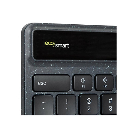 Gros plan sur un clavier. Touches noires avec lettrage blanc, dont la touche Esc et les touches de fonction. En haut à gauche, il est écrit "eco/smart".