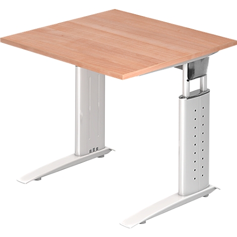 A height-adjustable desk with a light brown tabletop and white legs.