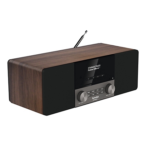 Ein braun-schwarzes Digitalradio mit Holzelementen und einem Display. Auf dem Display steht "STAR*SAT RADIO Robbie Williams -".