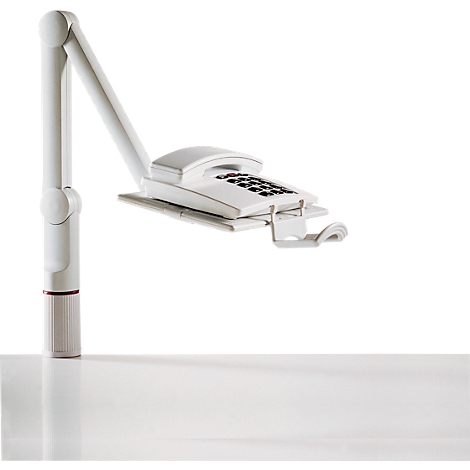 White phone with keypad, attached to a white, flexible bracket. On a light background.