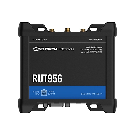 Schwarzer Router mit "RUT956" Aufschrift. Oben Anschlüsse für Antennen, darunter Logo und Text. Unterer Bereich mit technischen Daten.