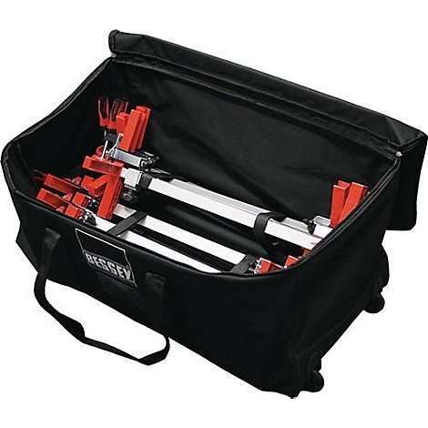 Sac de transport noir avec outils orange et argent. Logo "BESSEY" sur le sac.
