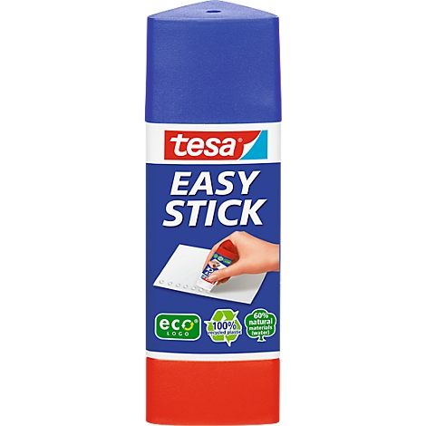 A Tesa Easy Stick glue stick advertising environmentally friendly products. A hand is gluing paper.