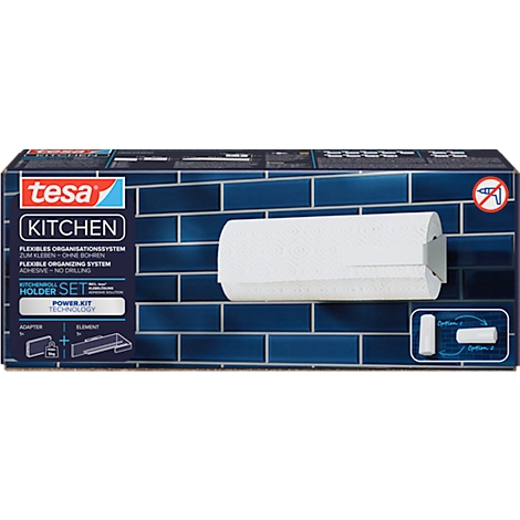 Tesa Küchenrollenhalter-Set, Verpackung vor blauen Fliesen. Produktname und -merkmale sind sichtbar.