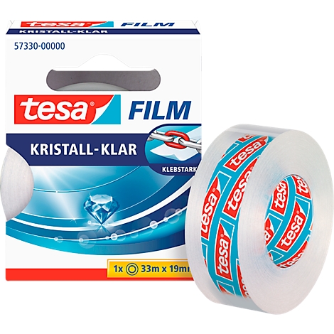 A roll of transparent tape next to its packaging. The package reads "tesa FILM, Kristall-Klar."