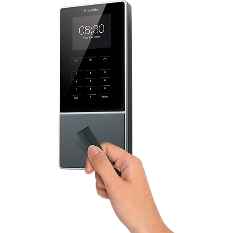 A hand holds a black card in front of a gray terminal with time and buttons.