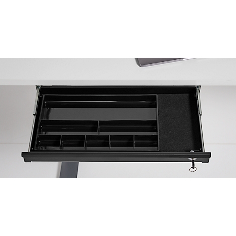 Tiroir de bureau noir sorti, avec divers compartiments pour l'organisation. À l'intérieur : stylos, notes et fournitures.