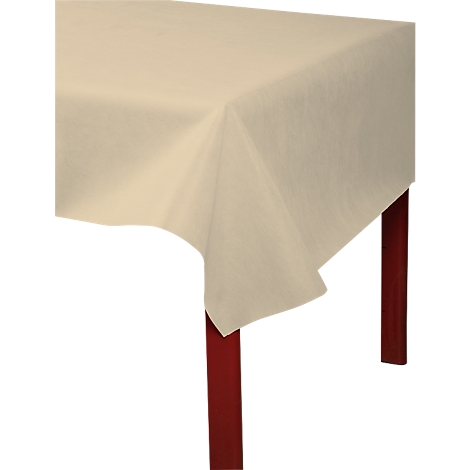 Beigefarbene Tischdecke liegt über einem Tisch, dessen Beine aus dunklem Holz bestehen.