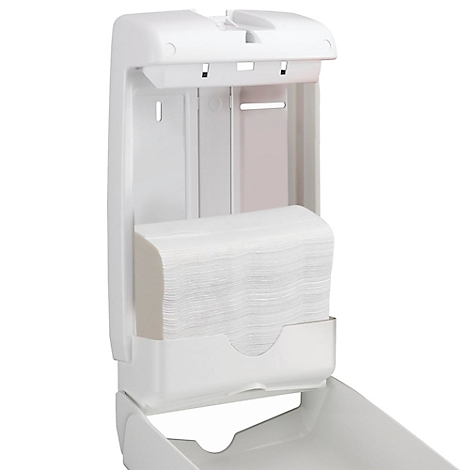 Dispensador de toallas de papel blanco con toallas de papel dobladas.