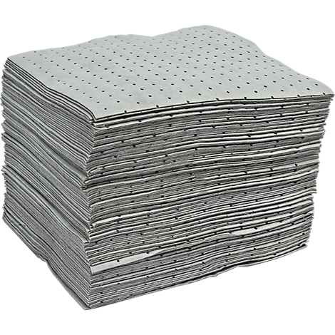 Una pila de esteras absorbentes grises y rectangulares con pequeños puntos oscuros, sobre una superficie blanca.