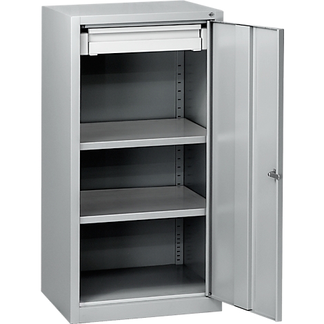 A gray filing cabinet with the door open. Inside, several shelves and a pull-out drawer are visible.