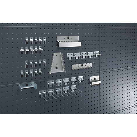 Grey pegboard with various metal holders, hooks and shelves.