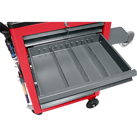 Open drawer of a red toolbox. The drawer is gray and divided into several compartments.