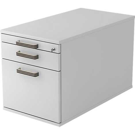 White file cabinet with three drawers and brass-colored handles. A key is in the lock.