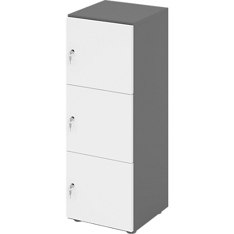 Kast met drie compartimenten, wit met grijs frame. Elk compartiment heeft een sleutelgat.