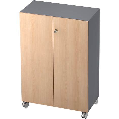 A wooden cabinet on wheels, with gray top and side surfaces. Two doors, silver handle. Light brown wood.