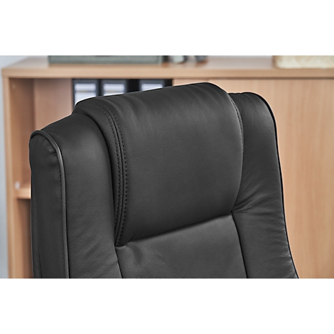 Black office chair with padded headrest. A bookshelf can be seen in the background.