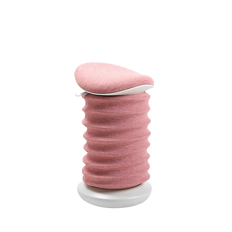 Zylindrisches, rosa Objekt auf weißem Podest und mit hellem Deckel. Die Oberfläche hat eine wellenartige Struktur.