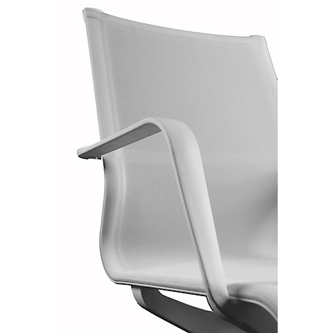 Close-up of a white chair with armrest.