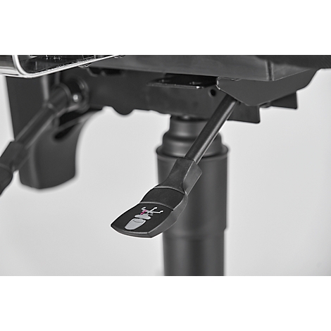 Close-up of a black office chair with lever showing height adjustment.