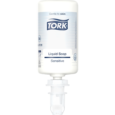 Bouteille de distributeur de savon blanche avec le logo 'TORK' et les mots 'Sensitive Liquid Soap'.