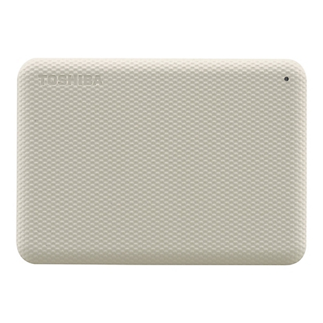 Disque dur externe beige avec surface en relief, lettrage TOSHIBA et voyant lumineux.