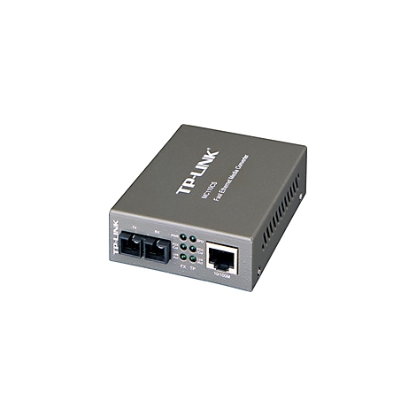 Un convertisseur média TP-Link gris avec ports et indicateurs LED, texte : MC110CS Fast Ethernet.