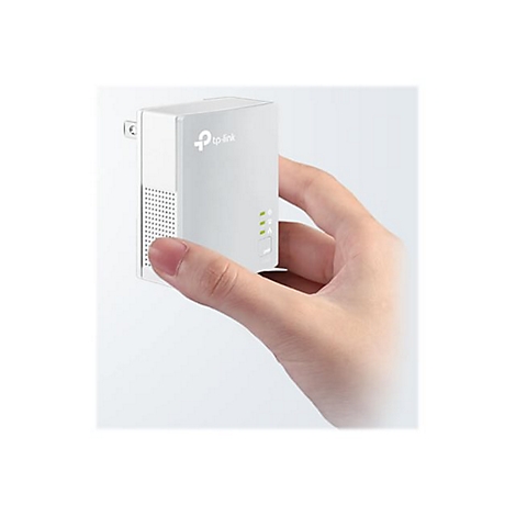 Eine Hand hÃ¤lt einen weiÃŸen TP-Link-Repeater. Auf der Vorderseite befinden sich grÃ¼ne Lichter.