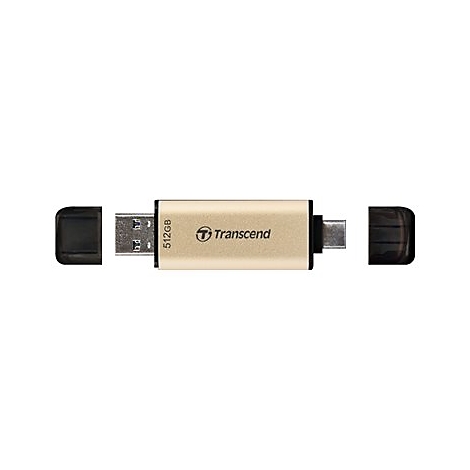 Une clé USB Transcend dorée, 512 Go, avec des capuchons noirs ouverts. Inscription "Transcend".