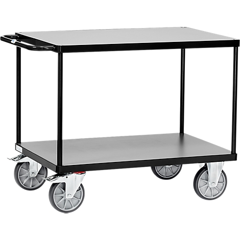 Black serving cart with two levels, on four castors. With handle at the top.