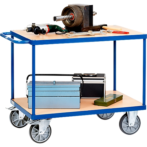 Tool cart with tools, including a gear, a drill, wrenches and clamps.