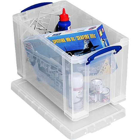 Transparante opbergdoos met hobbybenodigdheden: modelbouwpakket, verf, lijm.