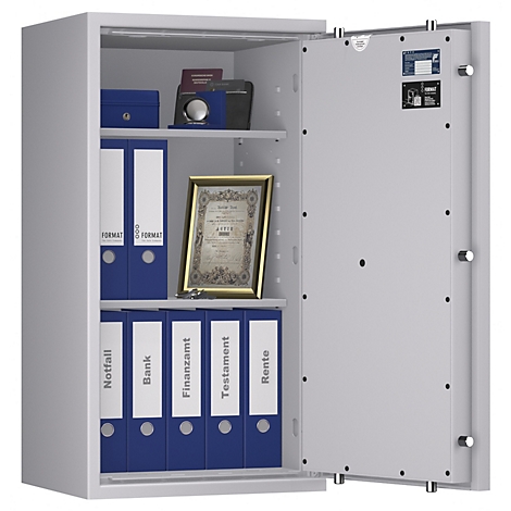 Grauer Tresor, offen, mit Aktenordnern und Dokumenten. Auf der Tür sind Sicherheitshinweise angebracht.