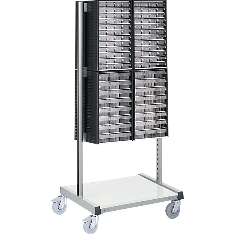 Black, rolling card file with many drawers, on a light background. Metal frame, four castors.