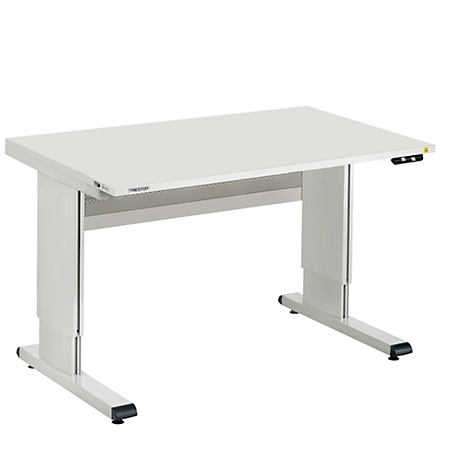 A height-adjustable white desk with gray legs and black feet. The text "TREIBAU" is visible on the table top.