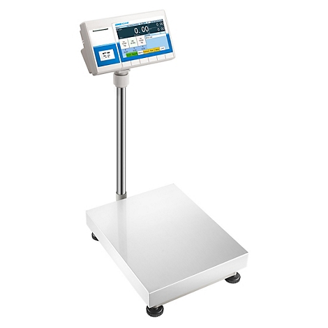 Balance avec écran, monté sur un tuyau métallique au-dessus d'une plate-forme rectangulaire.