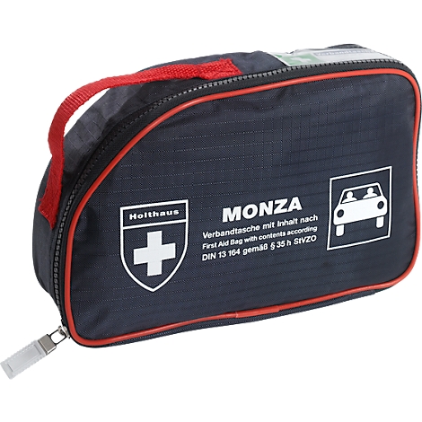 Trousse de premiers secours bleu foncé avec poignée et fermeture éclair rouges, croix blanche et imprimé.