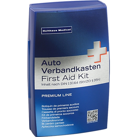 Trousse de premiers secours bleue avec croix blanche et texte: Auto Verbandkasten First Aid Kit. Informations multilingues.