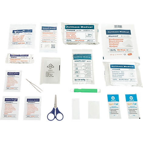 Trousse de premiers secours avec bandages, pince à épiler, ciseaux et tampons.