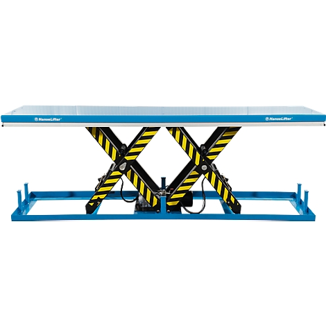 A blue scissor lift with yellow and black striped arms supporting a platform.