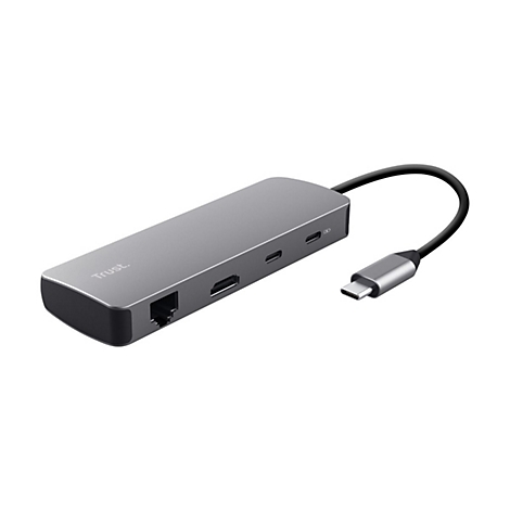 Grauer Trust USB-C Multiport-Adapter mit LAN-, HDMI- und USB-Anschlüssen auf weißem Hintergrund.