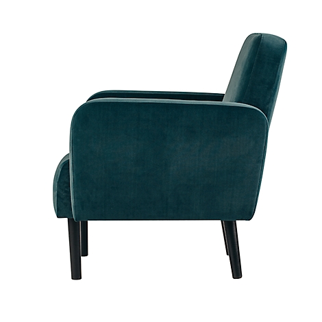 Teal fauteuil, zijaanzicht. Fluweelbekleding, zwarte poten.