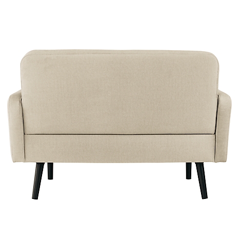 Beige bank met zwarte poten, achteraanzicht. Een eenvoudig ontwerp voor modern meubilair.