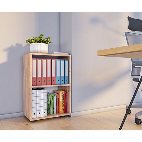 A wooden shelf with folders and books. A potted plant sits on the top shelf. A desk with a chair is on the right.