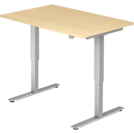 A height-adjustable desk with a light brown tabletop and a silver frame.