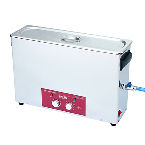 Ultrasonic cleaning machine with lid and control panel, next to it a blue hose.