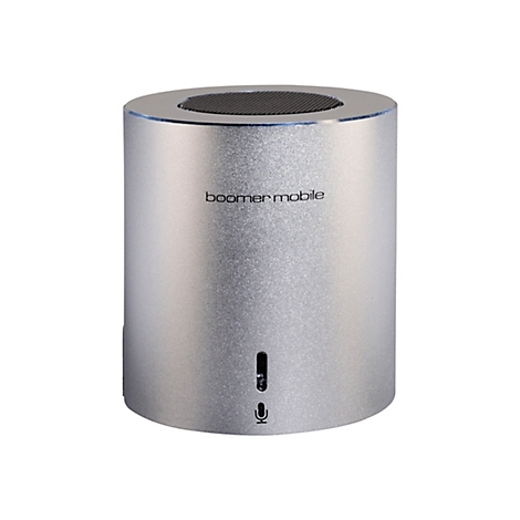 Silberner, zylinderförmiger Bluetooth-Lautsprecher mit schwarzem Gitter oben und Mikrofon-Symbol.