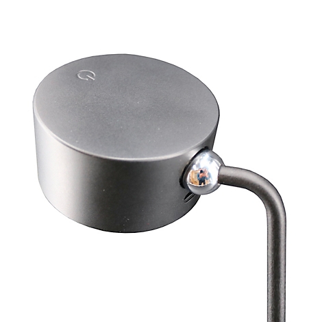 Grijze, cilindrische LED-lamp met een aan/uit-symbool aan de bovenkant. De lamp is bevestigd aan een gebogen, donkere arm.