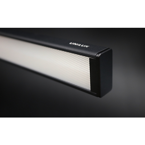 Nahaufnahme einer schwarzen LED-Leuchte mit diffuser Lichtfläche und Firmenlogo Unilux.