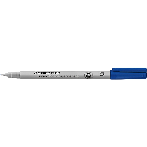 A blue Staedtler Lumocolor non-permanent marker lies horizontally. The pen has a blue cap and a gray tip.